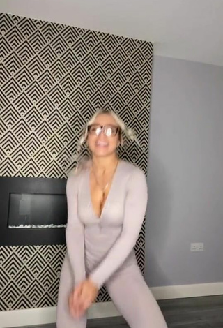 6. Beautiful Maria Shows Cleavage in Sexy Grey Overall
