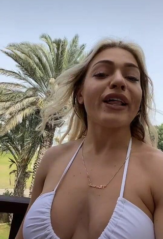 Sweetie Maria Shows Cleavage in White Bikini Top