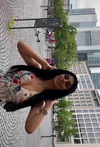 Sexy Mcamiri Shows Cleavage in Floral Dress in a Street
