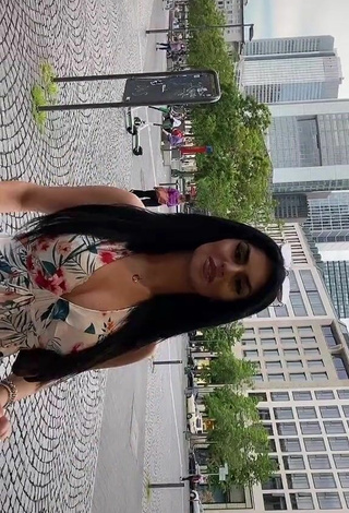 2. Sexy Mcamiri Shows Cleavage in Floral Dress in a Street