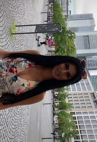 5. Sexy Mcamiri Shows Cleavage in Floral Dress in a Street