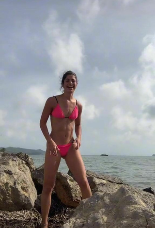 Sexy Mica Corimberto in Pink Bikini in the Sea at the Beach