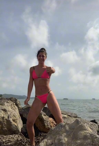 5. Sexy Mica Corimberto in Pink Bikini in the Sea at the Beach