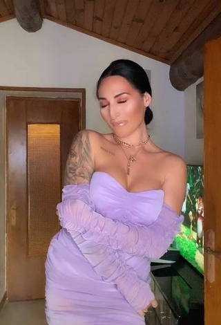 2. Really Cute Pocahontasmaria Shows Cleavage in Purple Dress