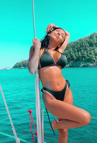 2. Sweetie Ruby Shows Cleavage in Black Bikini in the Sea on a Boat