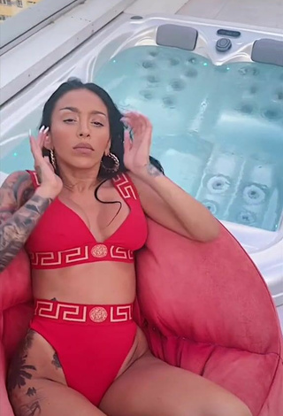 Sexy Ruby Shows Cleavage in Red Bikini