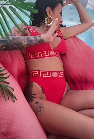 3. Sexy Ruby Shows Cleavage in Red Bikini