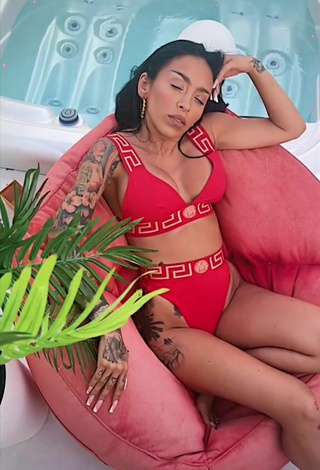 5. Sexy Ruby Shows Cleavage in Red Bikini