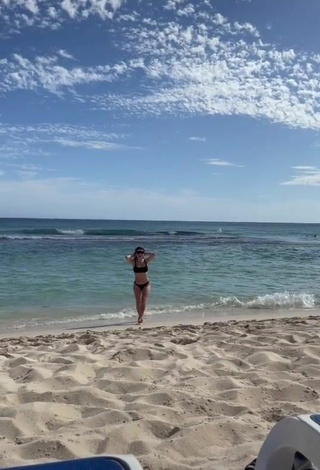 Sexy Şeyda Erdoğan Shows Cleavage in Black Bikini at the Beach