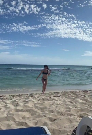 4. Sexy Şeyda Erdoğan Shows Cleavage in Black Bikini at the Beach