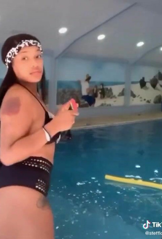 6. Sexy Stefflon Don Shows Cleavage in Black Bikini at the Swimming Pool and Bouncing Boobs