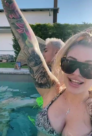 6. Sexy Timii Shows Cleavage in Snake Print Bikini at the Swimming Pool