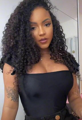 4. Hot Ziane Martins Shows Cleavage in Black Top