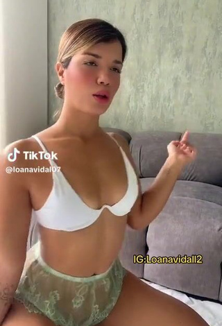 2. Sexy Loana Vidal Shows Cleavage in White Bikini Top