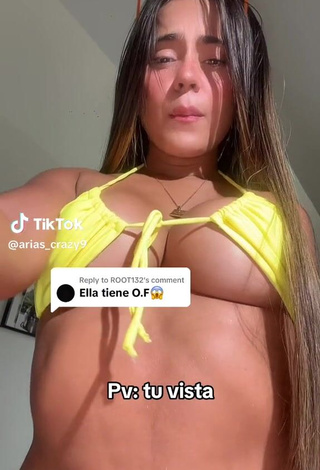 1. Sexy user5ochworsmh Shows Cleavage in Yellow Bikini Top