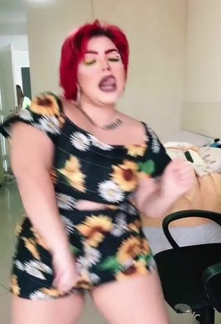 2. Seductive Alexia Tamira Shows Cleavage in Floral Overall