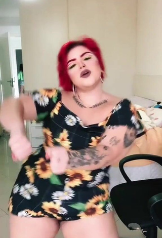 3. Seductive Alexia Tamira Shows Cleavage in Floral Overall
