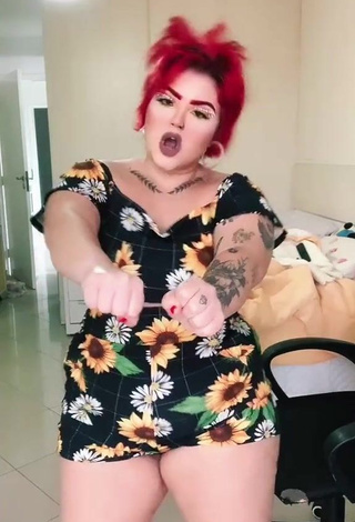 4. Seductive Alexia Tamira Shows Cleavage in Floral Overall