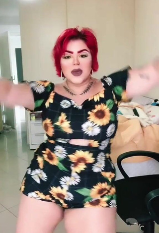 6. Seductive Alexia Tamira Shows Cleavage in Floral Overall