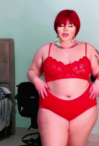 2. Sexy Alexia Tamira Shows Cleavage in Red Lingerie