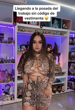 Cute Ama Blitz Shows Cleavage in Snake Print Dress Braless