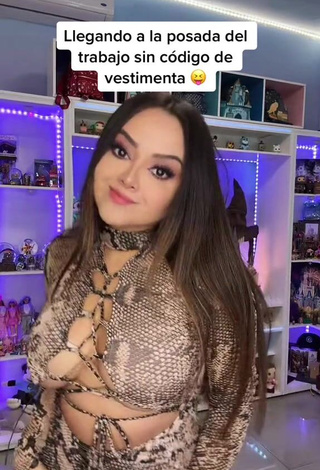 5. Cute Ama Blitz Shows Cleavage in Snake Print Dress Braless
