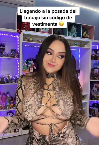 6. Cute Ama Blitz Shows Cleavage in Snake Print Dress Braless