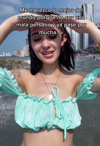 Beautiful Amara Que Linda Shows Cleavage in Sexy Turquoise Bikini at the Beach