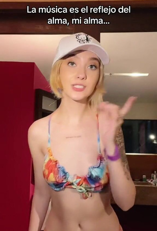 Hot Amara Que Linda Shows Cleavage in Bikini Top