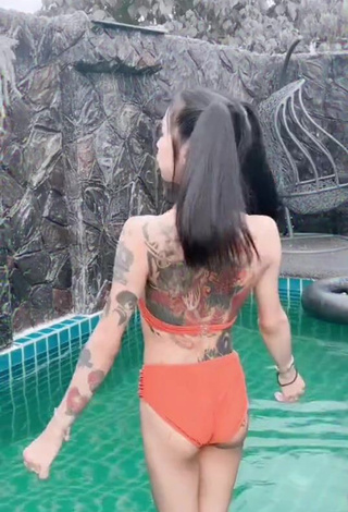 Atom Tattapol Shows Cleavage in Cute Orange Bikini