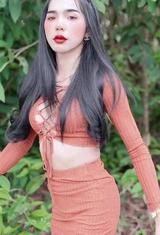 2. Pretty Atom Tattapol Shows Cleavage in Crop Top