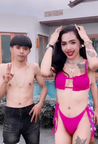 2. Magnificent Atom Tattapol Shows Cleavage in Pink Bikini