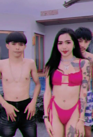 3. Magnificent Atom Tattapol Shows Cleavage in Pink Bikini