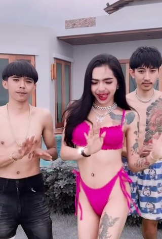 4. Magnificent Atom Tattapol Shows Cleavage in Pink Bikini