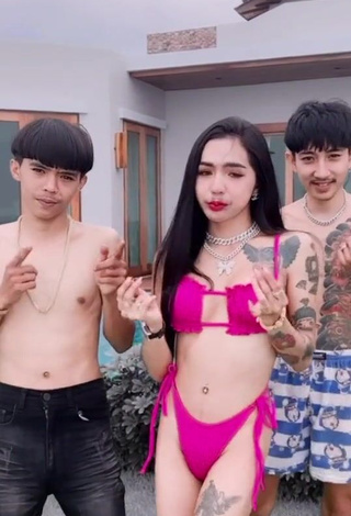 6. Magnificent Atom Tattapol Shows Cleavage in Pink Bikini