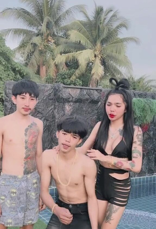 Beautiful Atom Tattapol Shows Cleavage in Sexy Black Bikini Top