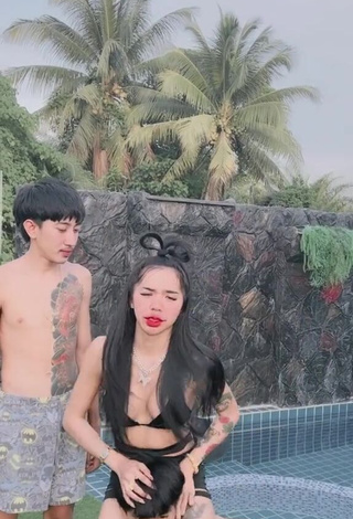 2. Beautiful Atom Tattapol Shows Cleavage in Sexy Black Bikini Top