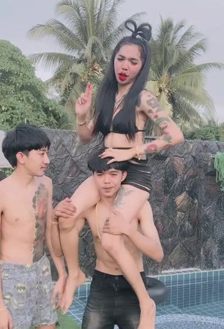3. Beautiful Atom Tattapol Shows Cleavage in Sexy Black Bikini Top