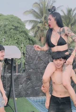 4. Beautiful Atom Tattapol Shows Cleavage in Sexy Black Bikini Top
