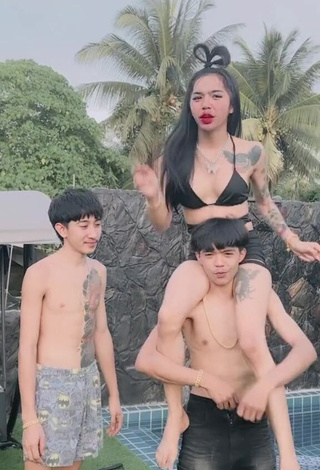 5. Beautiful Atom Tattapol Shows Cleavage in Sexy Black Bikini Top