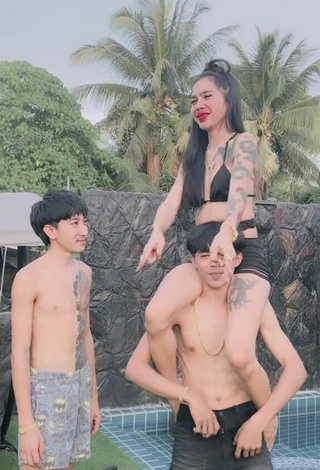 6. Beautiful Atom Tattapol Shows Cleavage in Sexy Black Bikini Top