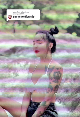 5. Hot Atom Tattapol Shows Cleavage in White Bra
