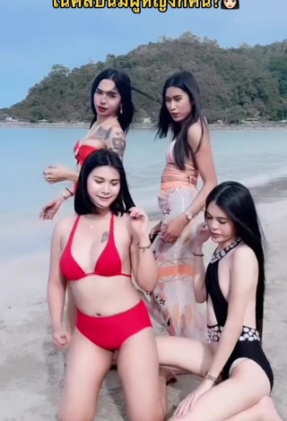Sweetie Atom Tattapol Shows Cleavage in Red Bikini at the Beach