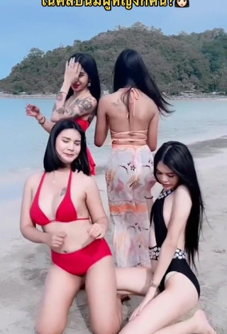2. Sweetie Atom Tattapol Shows Cleavage in Red Bikini at the Beach
