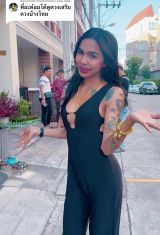 Hot Atom Tattapol Shows Cleavage in Black Overall