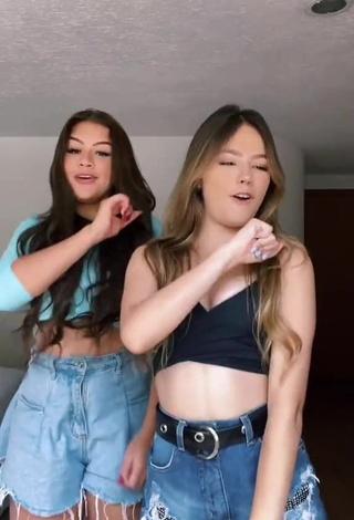 4. bela Shows Cleavage in Cute Black Crop Top