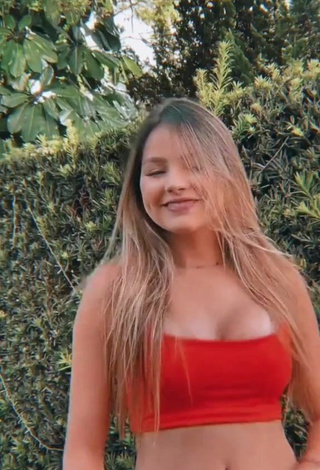 4. Adorable bela Shows Cleavage in Seductive Red Crop Top