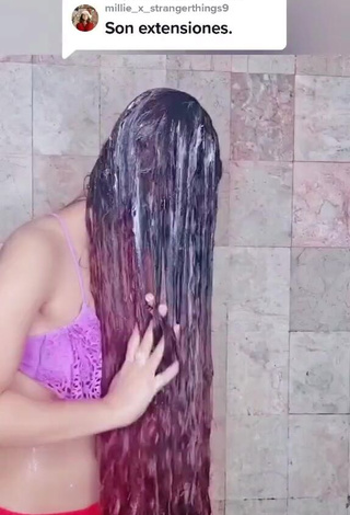 2. Hottie Bella Dueñas Shows Cleavage in Violet Bikini Top