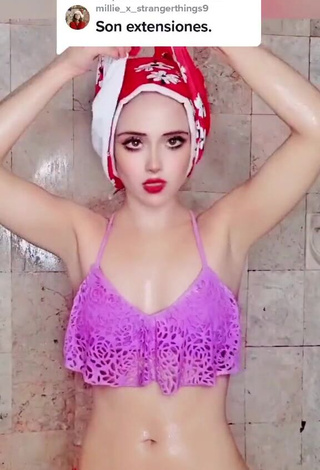 6. Hottie Bella Dueñas Shows Cleavage in Violet Bikini Top