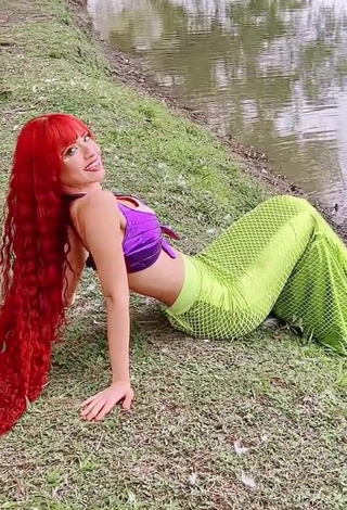 4. Bella Dueñas Looks Wonderful in Purple Crop Top